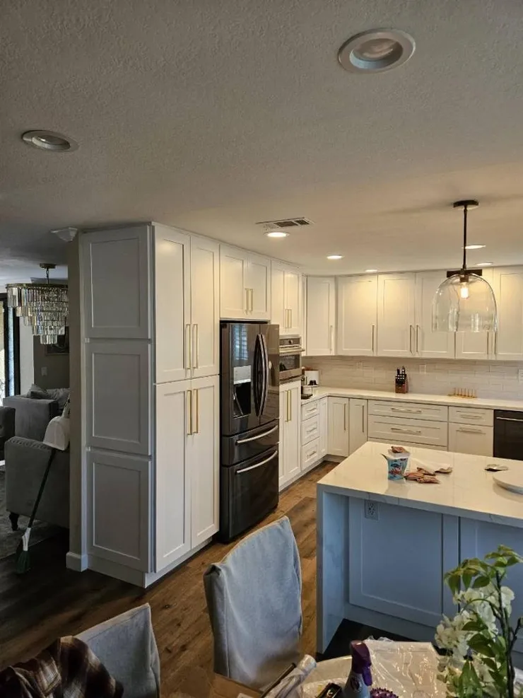 Modern bathroom renovation with custom vanity and tile work